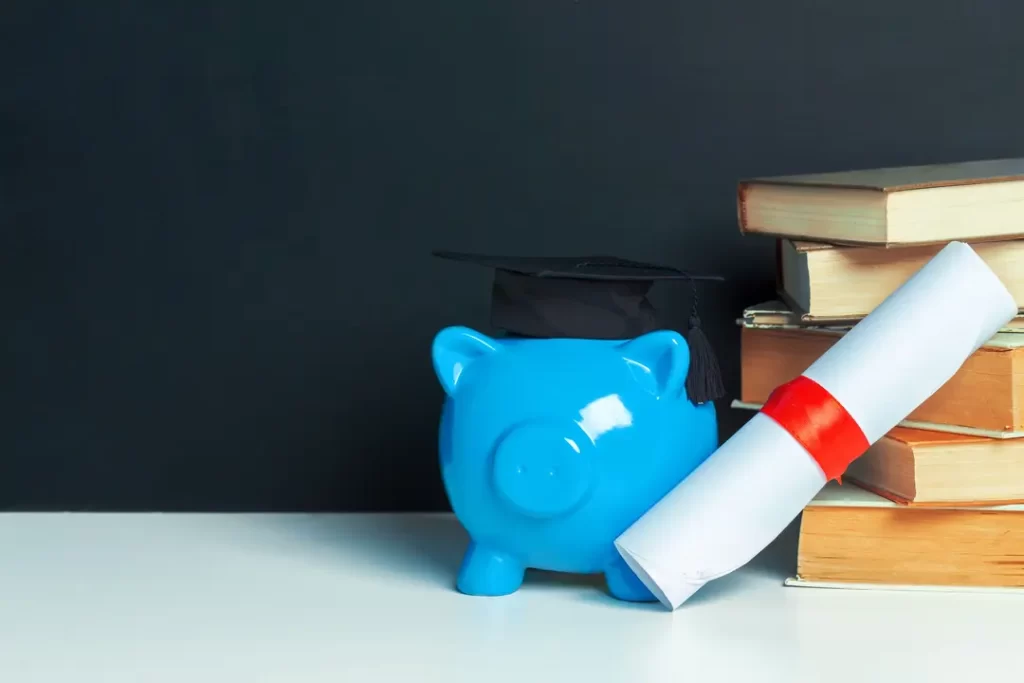 College graduate student diploma piggy bank, depicting ICICI Bank education loans without collateral for diploma courses