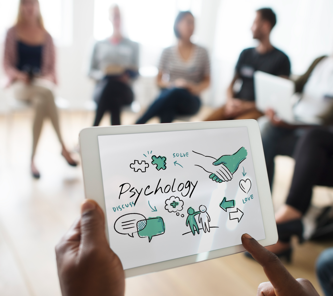 Masters in Psychology abroad with scholarship: A group of students studying psychology in a classroom.